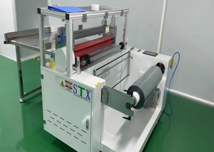 Automatic film cutting machine